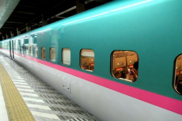The shinkansen to Sendai is green in colour