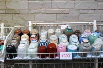Inexpensive mugs outside the shop