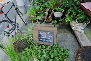 A sign outside the house