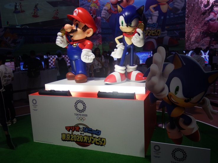 Mario and Sonic teaming up to compete.