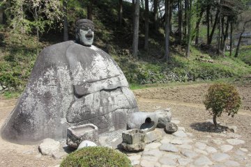 Stone Buddha bringing good fortune