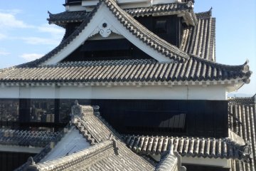 A picture of the larger tower from the smaller one. Notice the fine roofing work that is a 1960s reconstruction implementing authentic tools and materials.