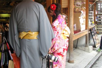A couple choosing souvenirs