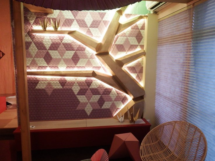 The sitting bench is springtime in origami.
