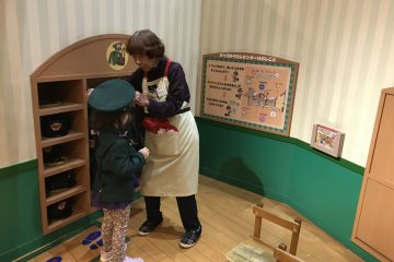 Dress up like a Japan Post worker and deliver mail!