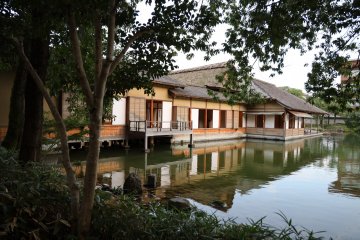 Main building overlooking Yokokan Garden's lake