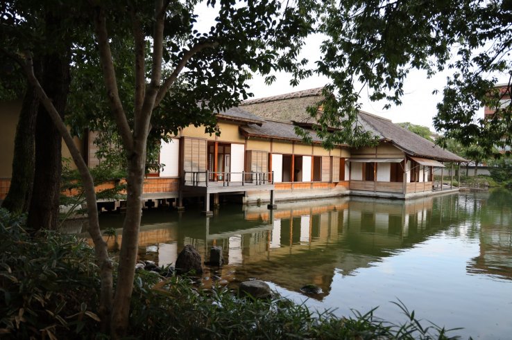 Main building overlooking Yokokan Garden's lake