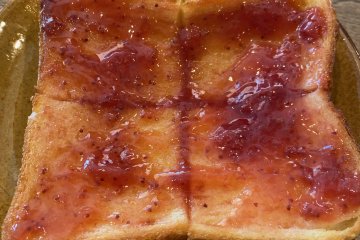 Toast with butter and strawberry jam is excellent