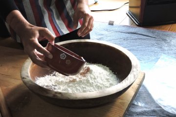 Adding water to flour