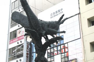 Metal sculpture of a grasshopper in Ikebukuro