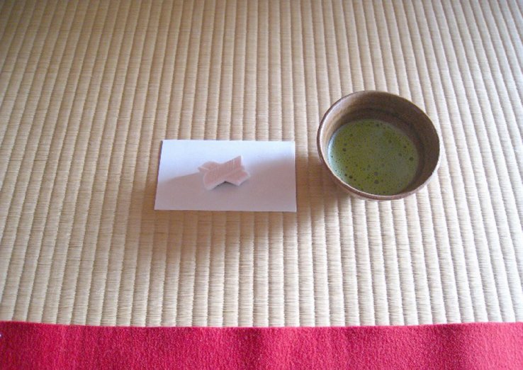 A bowl of matcha and Japanese sweets
