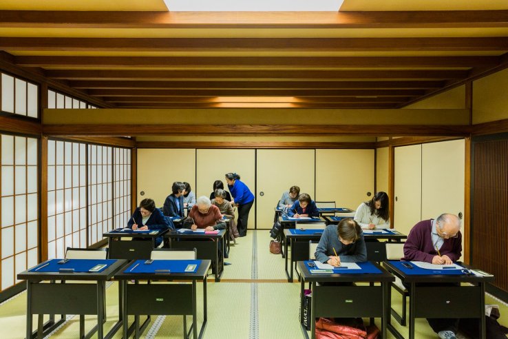 Revel in the quiet serenity of the sutra copying