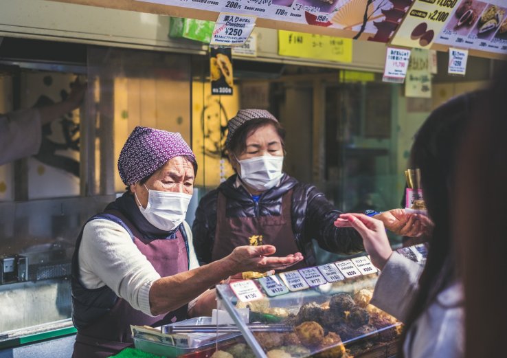 Food handlers often wear masks as a courtesy