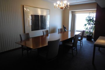 The Imperial Suite room has a dining table