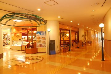 The hotel is connected to a commercial building