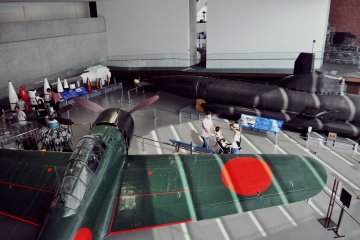 There is a "large objects room" with a collection of military aircraft and other objects.