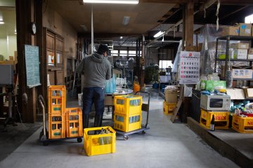 Preparing sake to be sold in the shops
