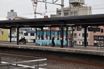 Yufuin station: free foot bath on a platform