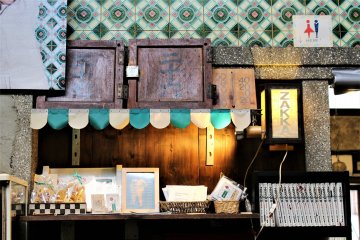 Shoebox doors used in the old bathhouse feature as decorations