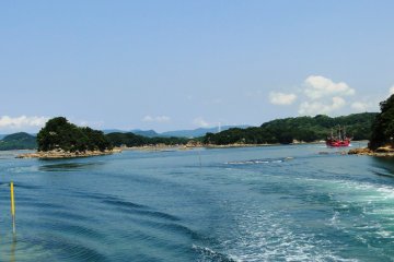 A pirate ship plies the waters of Kujukushima National Park
