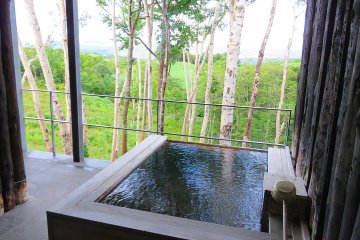 Private outside onsen on villa balcony