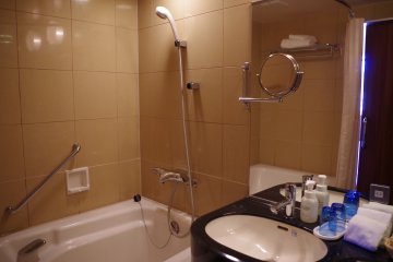 Bath and shower areas are separated in the executive rooms while the standard rooms have a shared bath and shower