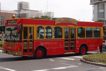 The retro styled red buses are impossible to miss