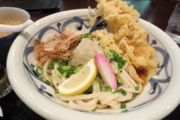 The noodles are sanuki udon, known to be a bit more firm, while the dish is called bukkake udon