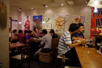 Local and foreign customers all enjoying some hot ramen at Kyoto Ramen Koji on the 10th Floor above Kyoto Station