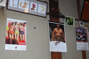 A sumo poster on the wall