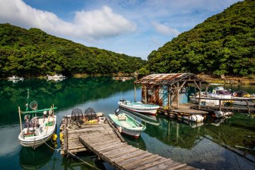 A charming clear-watered fishing harbor next to Kiri Church