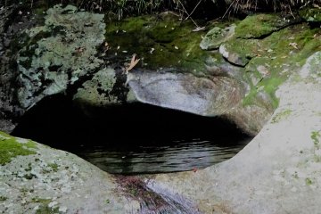 A deep pool is left where once a waterfall was. 