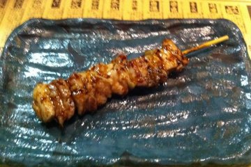 Chicken yakitori skewer dressed in sweet soy sauce