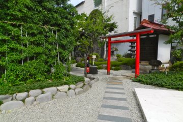 Behind the cafe and soba shop is the pebbled courtyard, with the information centre and gift shop.