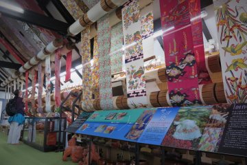 While Bingata symbolises Okinawa with its motifs of hibiscus and coral, some mainland Japanese motifs, such as cherry blossoms and pine trees were also incorporated for the export market. 
