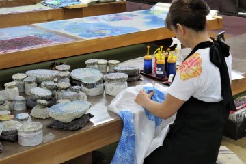 Watch the artisans at work and see how exquisite their ten-step process is. 