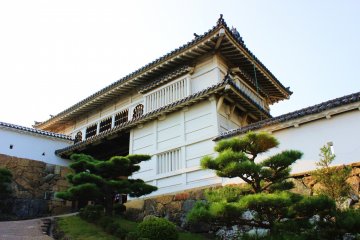 The might of medeival architecture juxtaposed with the delicate nature of Japanese gardening