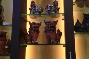 <p>Shisa&nbsp;are traditional beasts which you can see all around Okinawa. Here they are sold in statue form. The beasts are placed inside a building or on rooftops to protect a house, people, or village from&nbsp;calamities and negative energy. How about picking up a miniature set of shisa&nbsp;as a souvenir when you come visit Okinawa?&nbsp;</p>