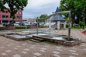 The cool water fountain runs on a timer so if you decide to walk under it, beware!