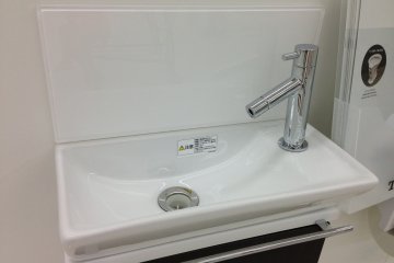 <p>Be advised that this is not a tiny urinal but rather a tiny sink. Travelers to Japan will see a lot of these here and there during their travels</p>