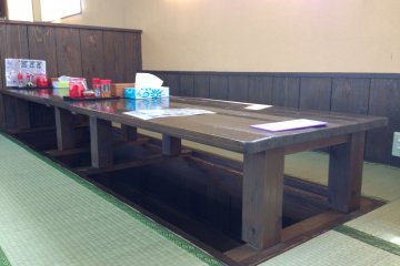 <p>There are regular tables to sit at, tatami tables, and these tatami tables with room to dangle your feet down below</p>
