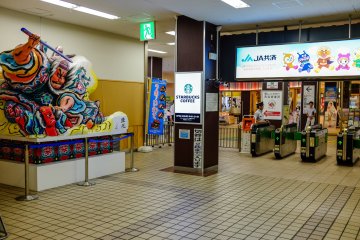 The station is decorated with miniature Nebuta floats