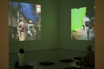 The three films consisted of a main piece being projected straight ahead and on either side was the behind the scenes of this main film. It was very interesting.
