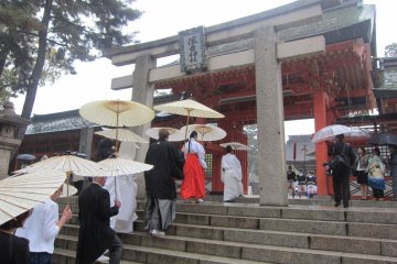 A wedding procession entering the central courtyard