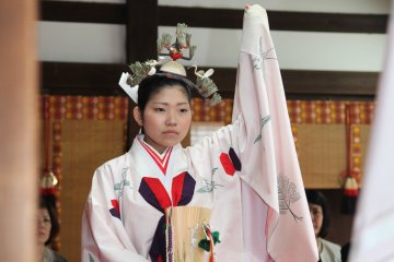 A Miko (Shrine Maiden) performing a dance 
