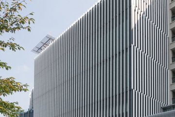 The Suntory Museum of Art has white ceramic accents on the exterior
