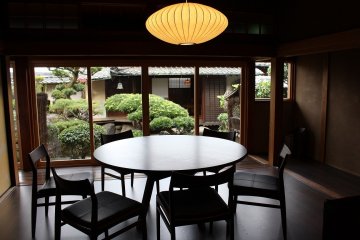 The dining room offers a view of the Japanese garden