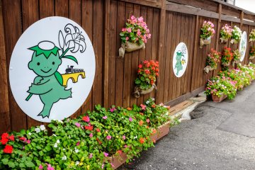 The mascot of the city, Karin-chan, is a cute kappa holding a bellflower