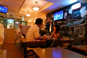 The spacious dining room and blackboard wall.