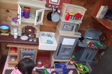 Inside there is a playroom with lots of toys, coloring pages, crafts and lots to keep children engaged on a rainy day. 